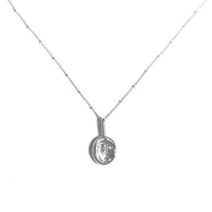 Concave face necklace