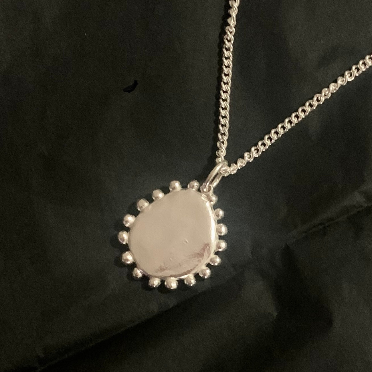Sun pebble pendant necklace